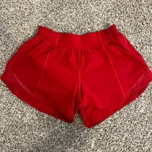 lululemon hotty hot shorts 4” in dark red